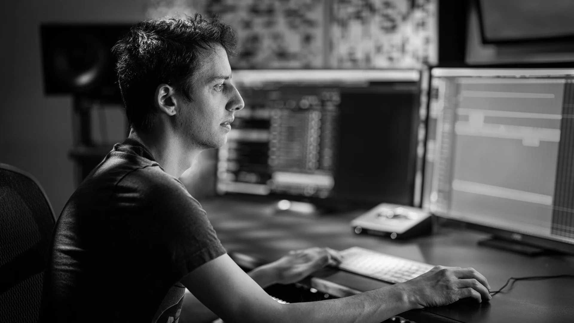Jonas Friedman composing at his studio desk