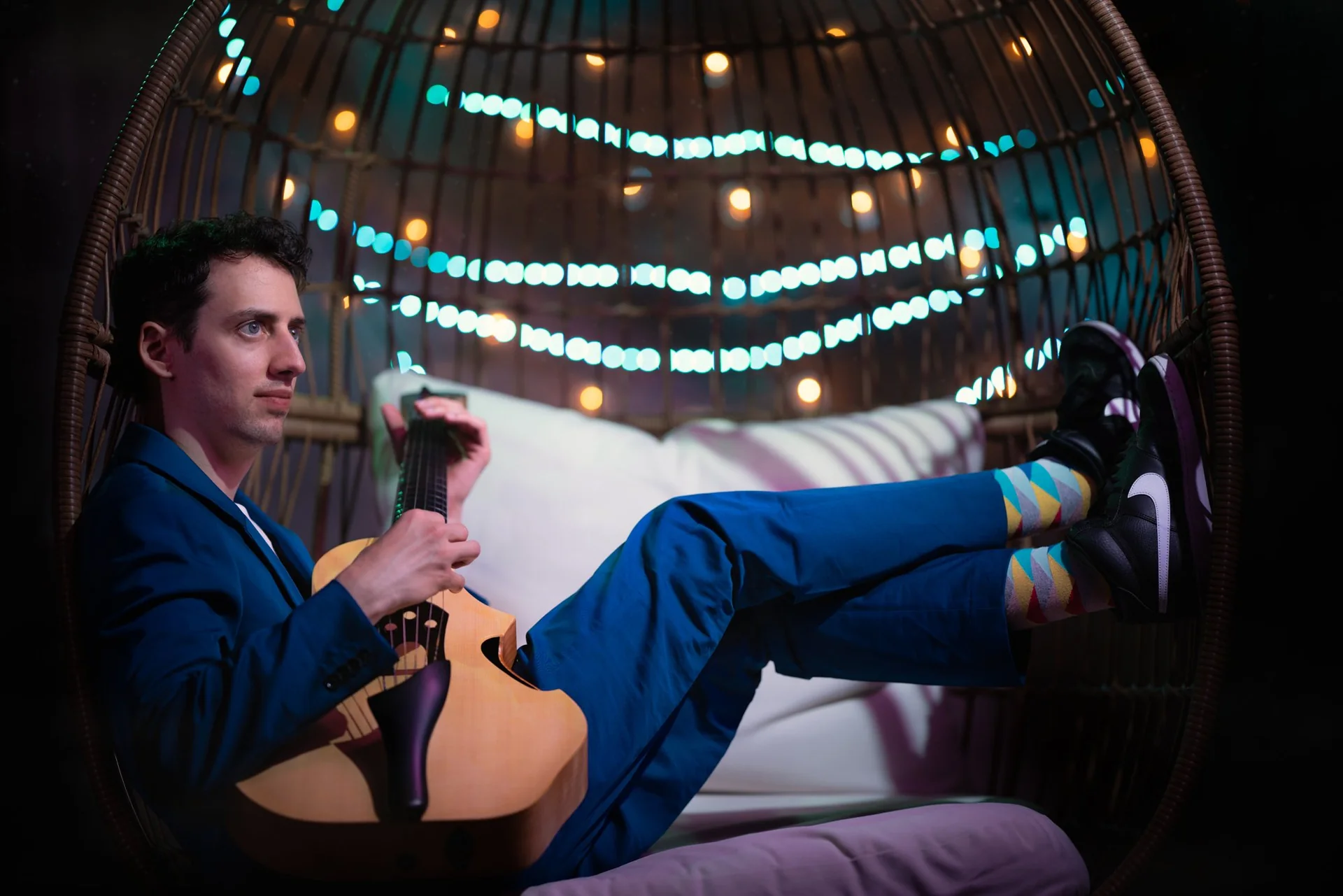 Jonas Friedman holding a string instrument
